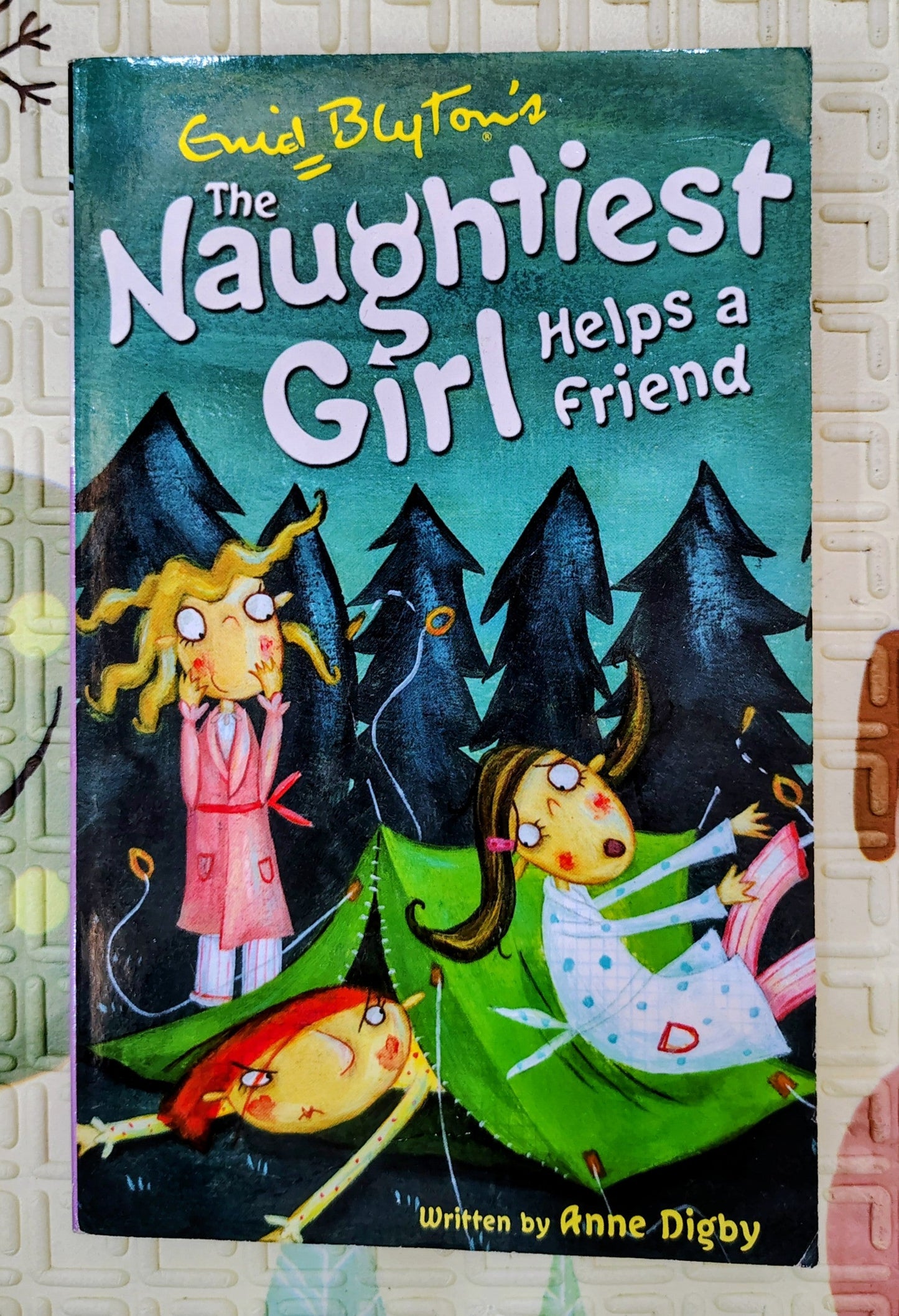The Naughtiest Girl Helps a Friend by Enid Blyton