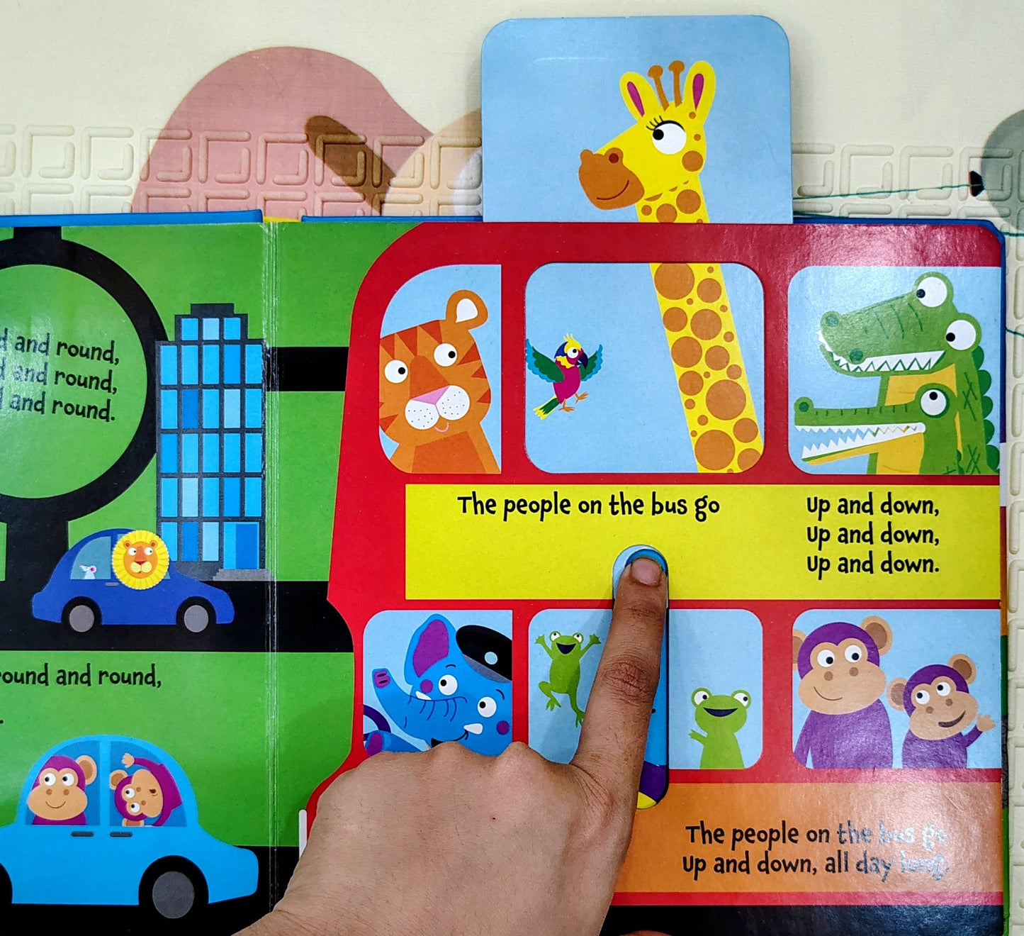 The Wheels on the Bus | Push and Slide Book