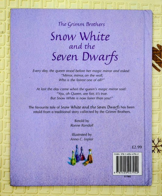 Snow White and the Seven Dwarfs by The Grimm Brothers
