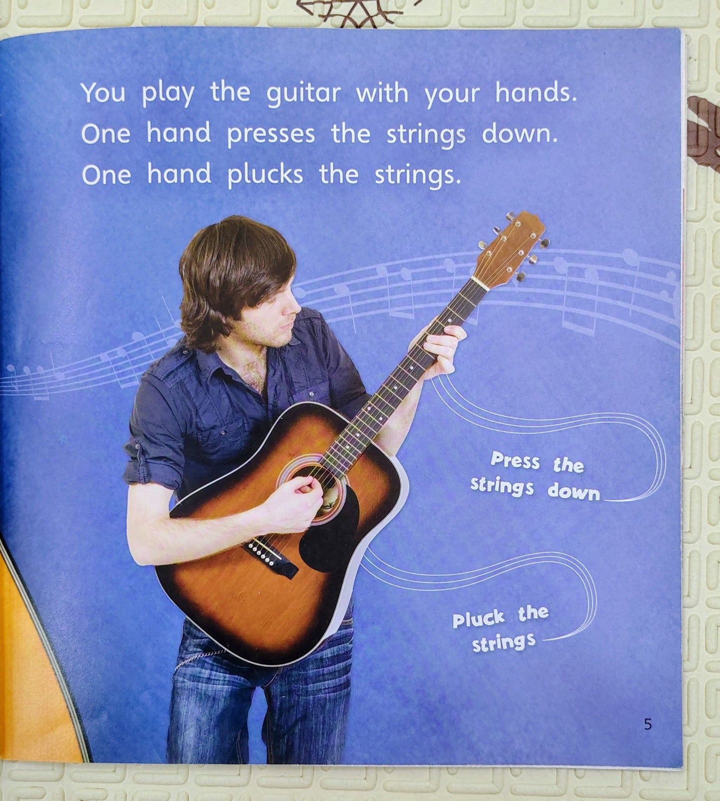 Play the Guitar by Pauline Cartwright