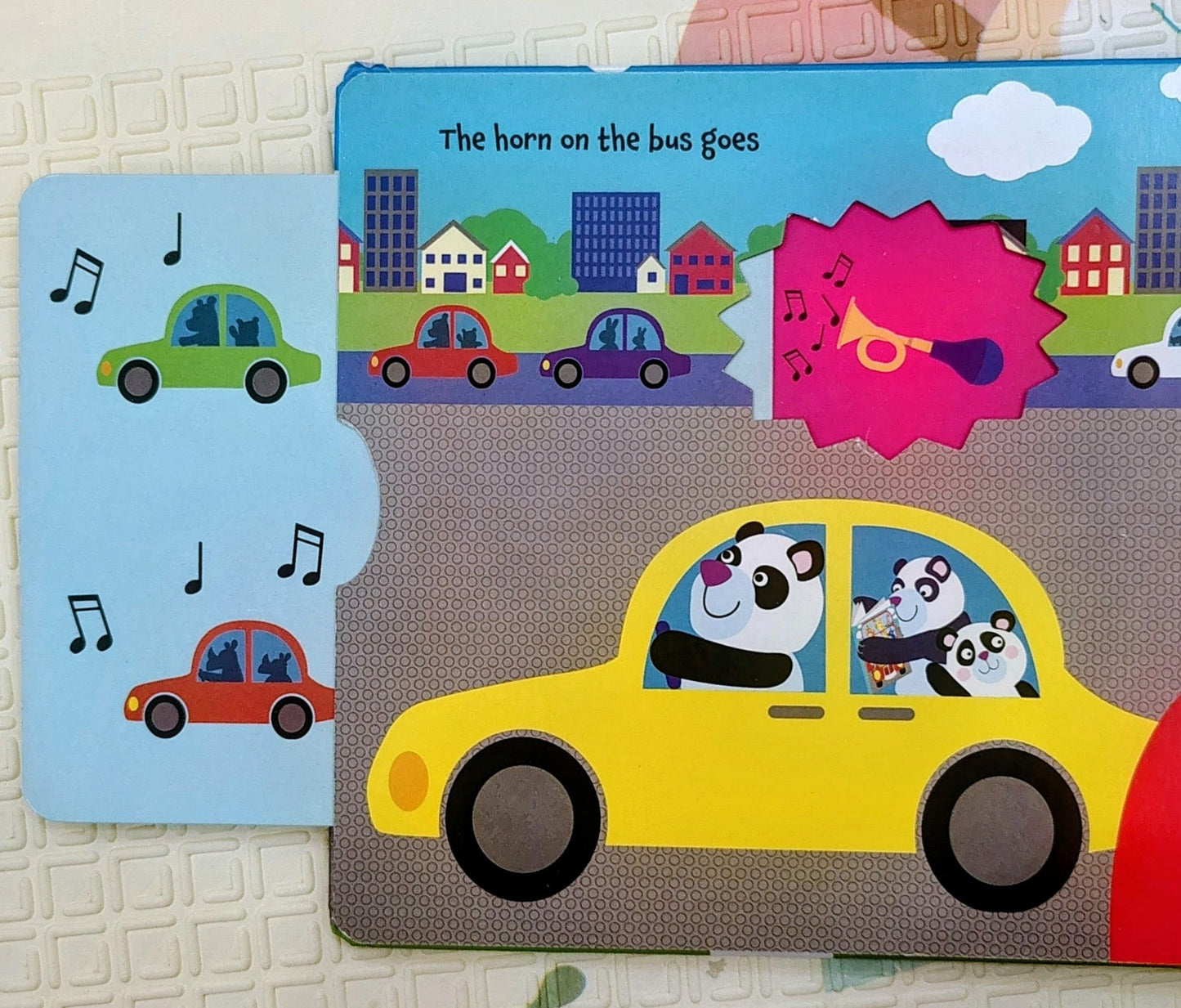 The Wheels on the Bus | Push and Slide Book