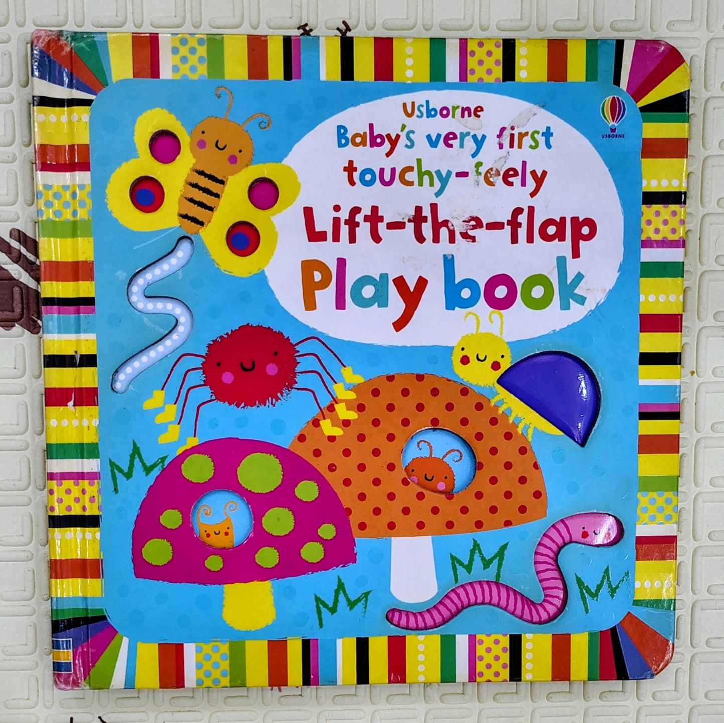 Baby's Very First Touchy-Feely Lift-the-flap Play Book by Usborne