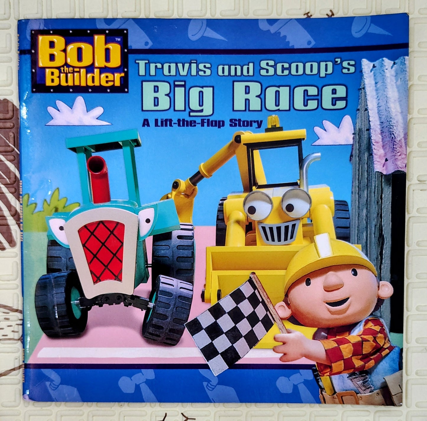 Travis and Scoop's Big Race by Bob the Builder | Lift the Flap