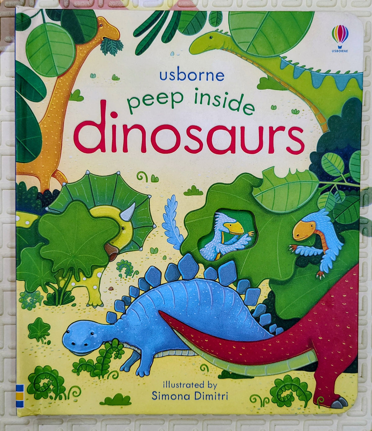 Peep Inside Dinosaurs by Usborne | Lift the Flap and Peek through