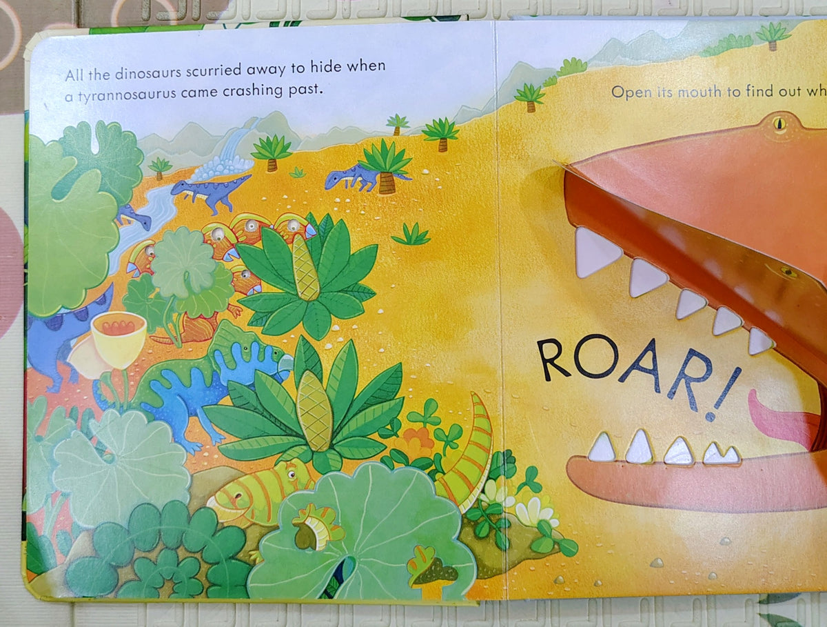 Peep Inside Dinosaurs by Usborne | Lift the Flap and Peek through