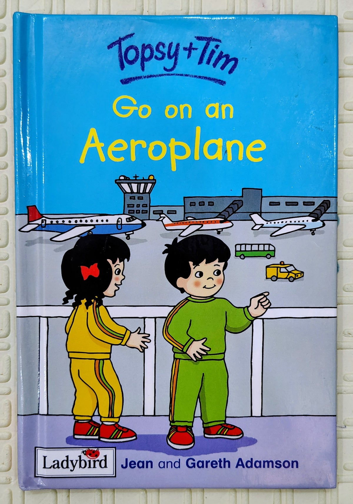 Topsy and Tim Go on an Aeroplane by Jean and Gareth Adamson | Ladybird