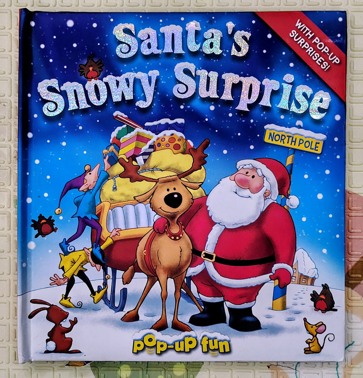 Santa's Snowy Surprise | North Pole | Festive Pop-Up | IglooBooks