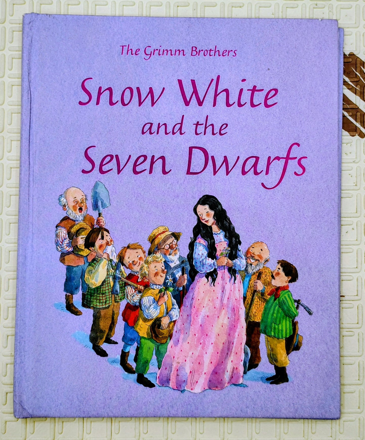 Snow White and the Seven Dwarfs by The Grimm Brothers